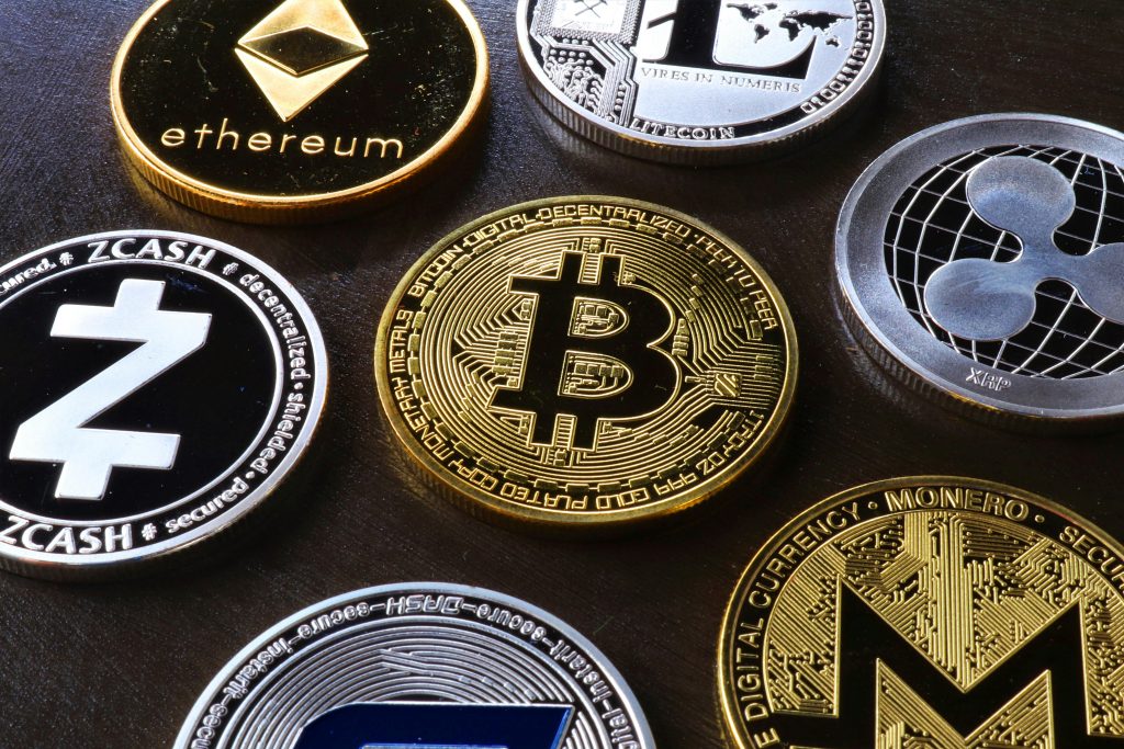 An image of cryptocurrency coins which include bitcoin, ethereum, ripple, solana, shiba coin and others